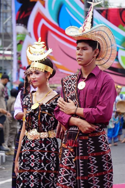 Indonesian With A Traditional Costume From Nusa Tenggara Timur At Ben