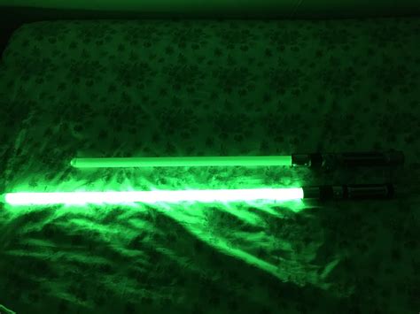 Brightness comparison between my first lightsaber (top), and my newest saber; its remade form ...