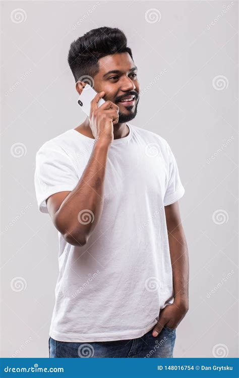 Young Handsome Indian Man Talking on Mobile Phone on White Background ...