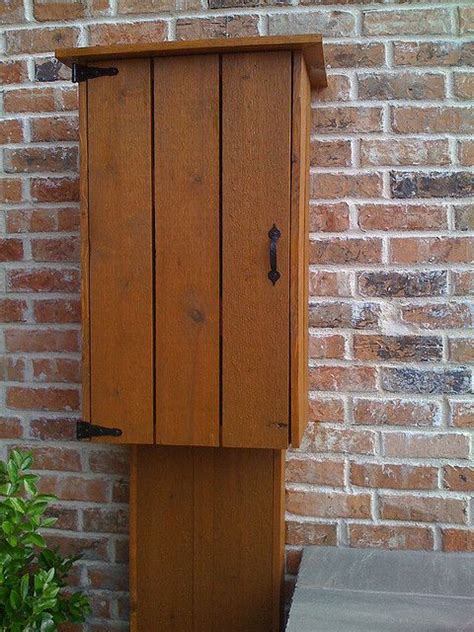 A Cute Way To Hide The Electrical Box Outdoor Electrical Box Cover