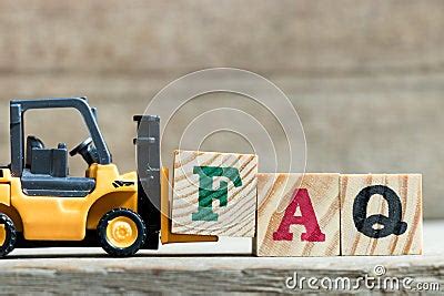 Toy Yellow Forklift Hold Letter Block F To Complete Word Faq