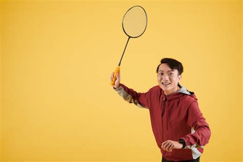 Premium Photo Man Enjoying Playing Badminton