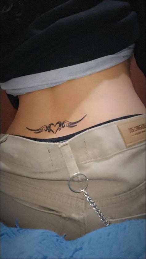 Tramp Stamp Tatoos For Womens Lower Back Tattoos Strength Tattoo