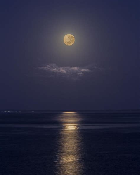 Full Moon over the ocean in the early morning : r/photocritique