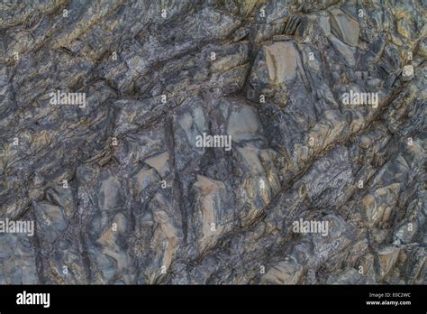 Rugged, textured, mountain rock face, full frame shot Stock Photo - Alamy