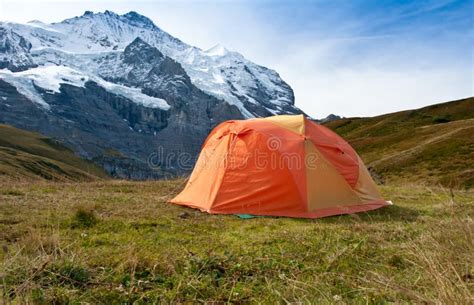 Camping tent in swiss alps stock photo. Image of berner - 19818974