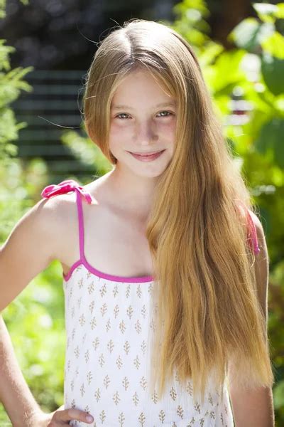 Portrait of a beautiful young blonde little girl Stock Photo by ...