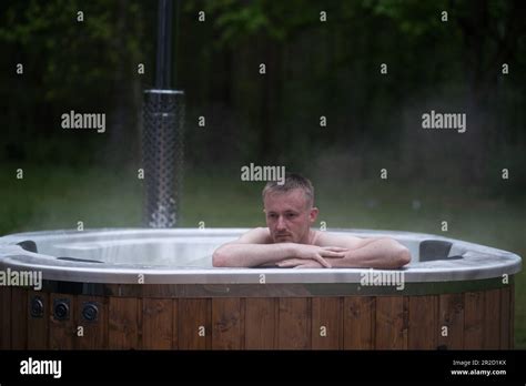 Man Relaxing Hot Tub SPA In Nature Stock Photo Alamy