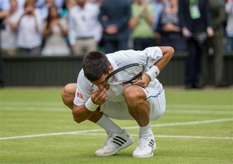 Djokovic Eats Grass Novak Djokovic Celebrates His Wimbledon