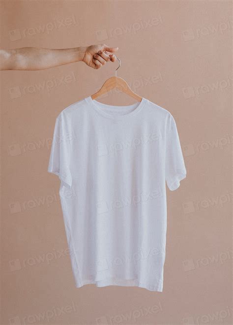 White shirt in a hanger | Premium Photo - rawpixel