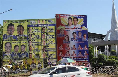 mandaue comelec set  tear  illegally  posters cebu daily news