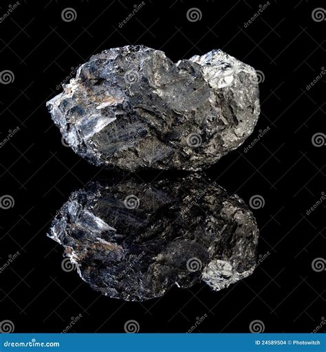 Black Coal And Shovel Lying On A Pile In House Basement Royalty Free