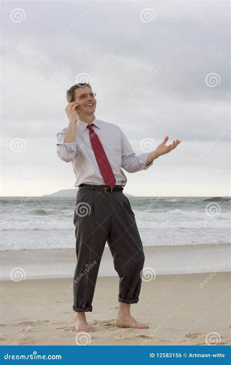 Mature Man Beach Talking Cell Phone Stock Photos Free Royalty Free Stock Photos From Dreamstime