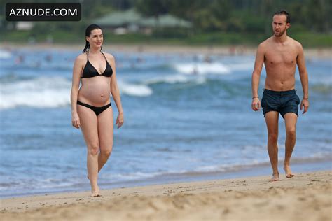 Anne Hathaway In A Bikini With Adam Shulmanin Hawaii AZNude
