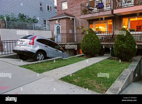 Car Parked In Steep Driveway In Brooklyn Ny Stock Photo Alamy