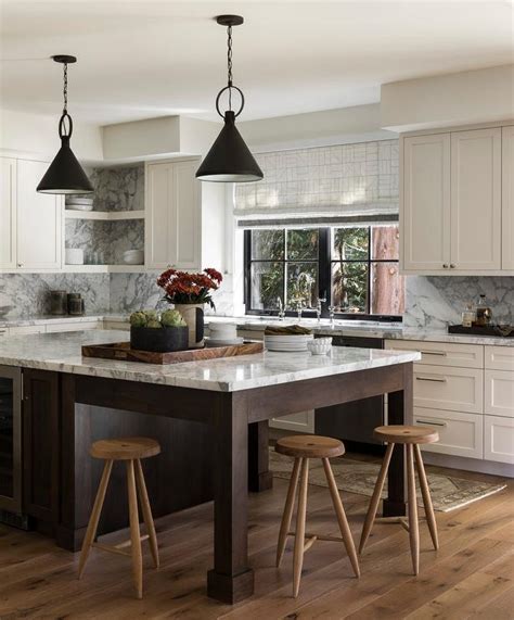 Brown Oak Kitchen Island With Rustic Tripod Stools Transitional Kitchen