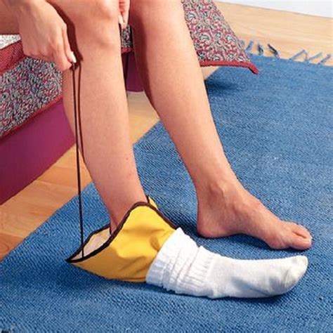 Etac Two Hand Folding Sock Aid