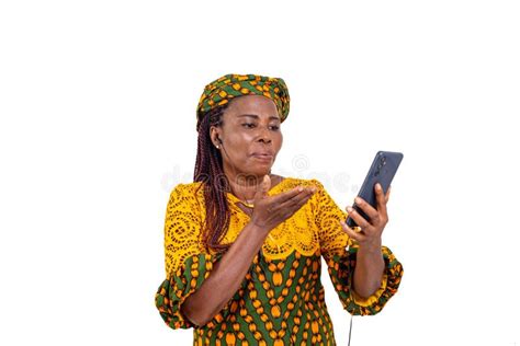 Portrait Of A Beautiful Mature Woman Blowing A Kiss During A Video Call