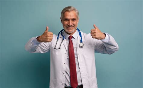Confident Mature Male Doctor With Thumbs Up Stock Image Image Of Hospital Looking