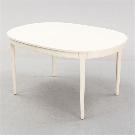 A Herrgården dining table by Carl Malmsten for Bodafors dated 1963