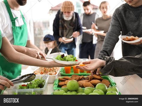 Volunteers Giving Food Image And Photo Free Trial Bigstock