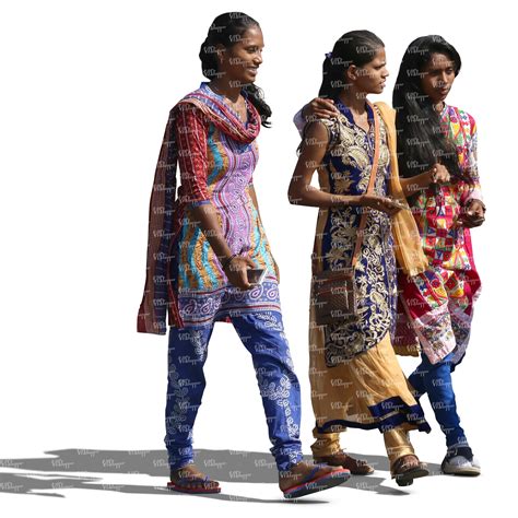 young hindu women wearing traditional indian clothes walking