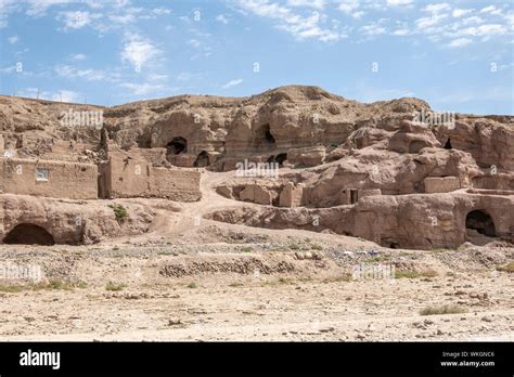 Cave houses of afghanistan's bamiyan province Stock Photo - Alamy