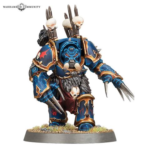 A Blue And Gold Painted Warhammer With Two Claws On It S Back Legs