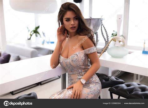 Sexy Brunette Silver Dress Sparkles Open Shoulders Decollete Sitting Bar Stock Photo By Diana