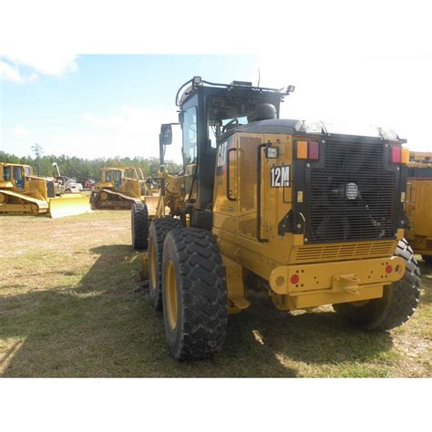 CAT 12M MOTOR GRADER - J.M. Wood Auction Company, Inc.