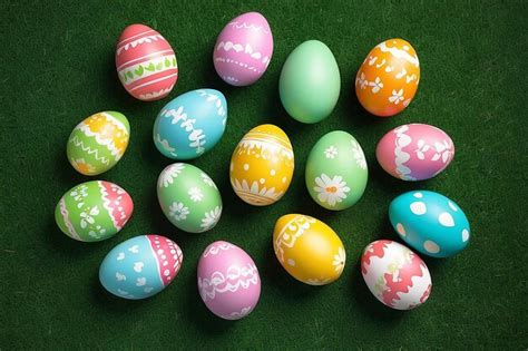 Premium Photo Colorful Easter Eggs On Green Grass