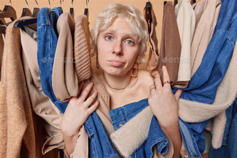 Nothing To Wear Concept Confused Blonde Woman Doesnt Know How To Put On Has Difficult Choice