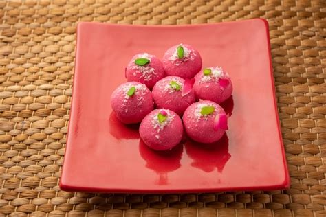 Premium Photo Delicious Pink Chumchum Or Rose Flavour Cham Cham Or Rasgulla Or Rasagola