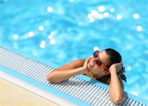 Enjoying summer relax in pool — Stock Photo © Dirima #19153473