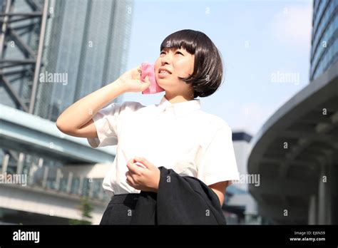 Japanese Business Woman Tired During The Hot Japanese Summer Stock Photo Alamy