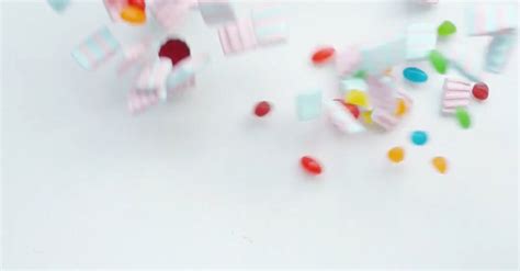 A Variety of Candy Falling on a Surface Free Stock Video Footage ...