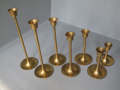 Vintage Set Of 7 Brass Candle Holders Graduated By Milkacervenka