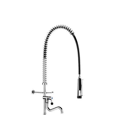 A Kitchen Faucet That Is Attached To A Sink