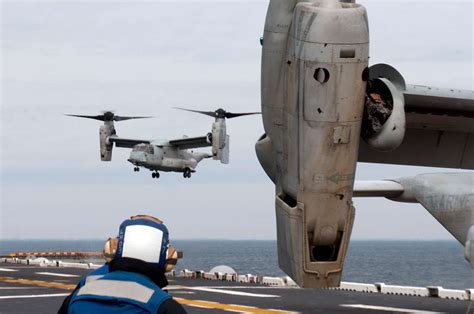 An Mv Osprey Lands On The Flight Deck Of The Amphibious Nara