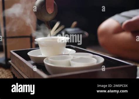 Traditional Chinese Gongfu Or Kung Fu Tea Ceremony Tea Master Pours