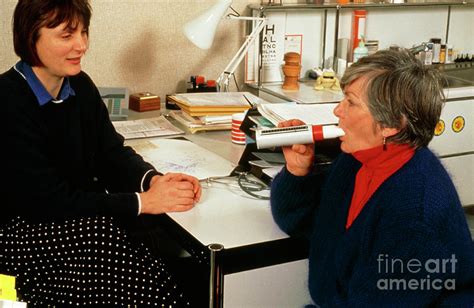 Doctor Tests Elderly Patient With Peak Flow Meter Photograph By Chris Priest And Mark Clarke