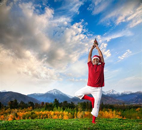 Christmas yoga tree pose — Stock Photo © byheaven #7952844