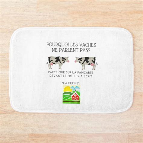 A White Bath Mat With Two Cows On It And The Words Pourqu Les Vaches Ne