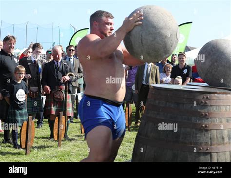 Centre left watches strongman luke stoltman hi-res stock photography ...