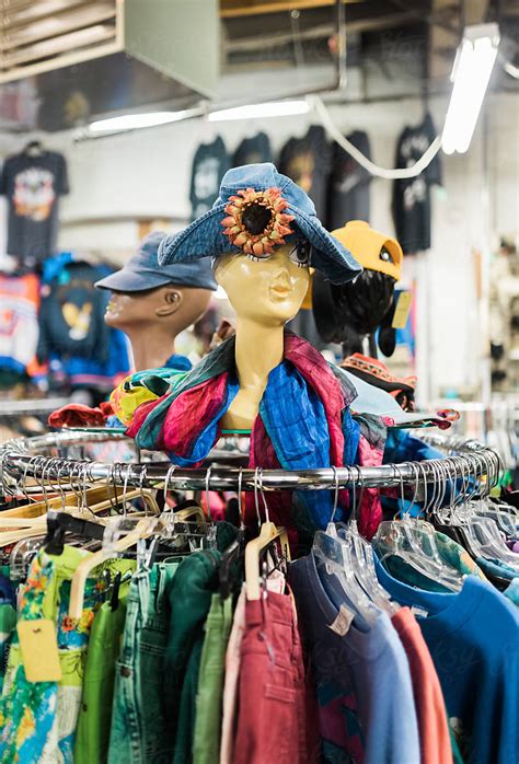 Mannequin Head On Clothing Rack In Thrift Store By Stocksy