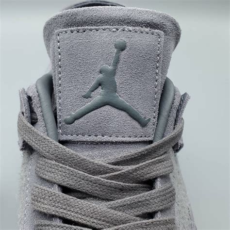 KAWS x Air Jordan 4 Retro 'Cool Grey' - 930155-003 | HOWKICK