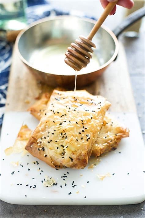 Phyllo Wrapped Feta With Honey And Sesame Seeds Cooking For Keeps