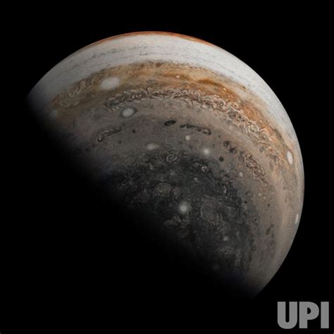 Photo Nasas Juno Spacecraft Glances Back At Jupiters South Pole