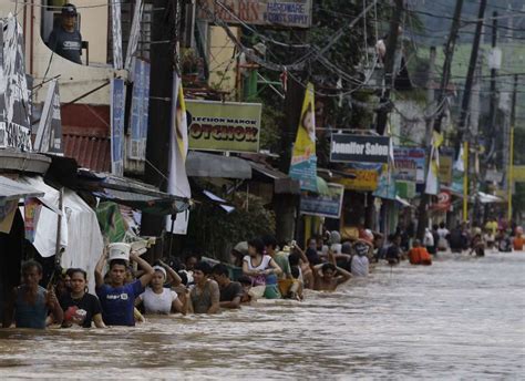 Manila Flood Pictures Show Devastation As Water Engulfs Philippines