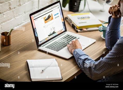 working home laptop Stock Photo - Alamy